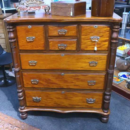 COLONIAL KAURI SCOTCH CHEST WITH MOTTLE DRAWER FRONTS. 1170 x 560 x 1290mm. Drawer runners recently restored.