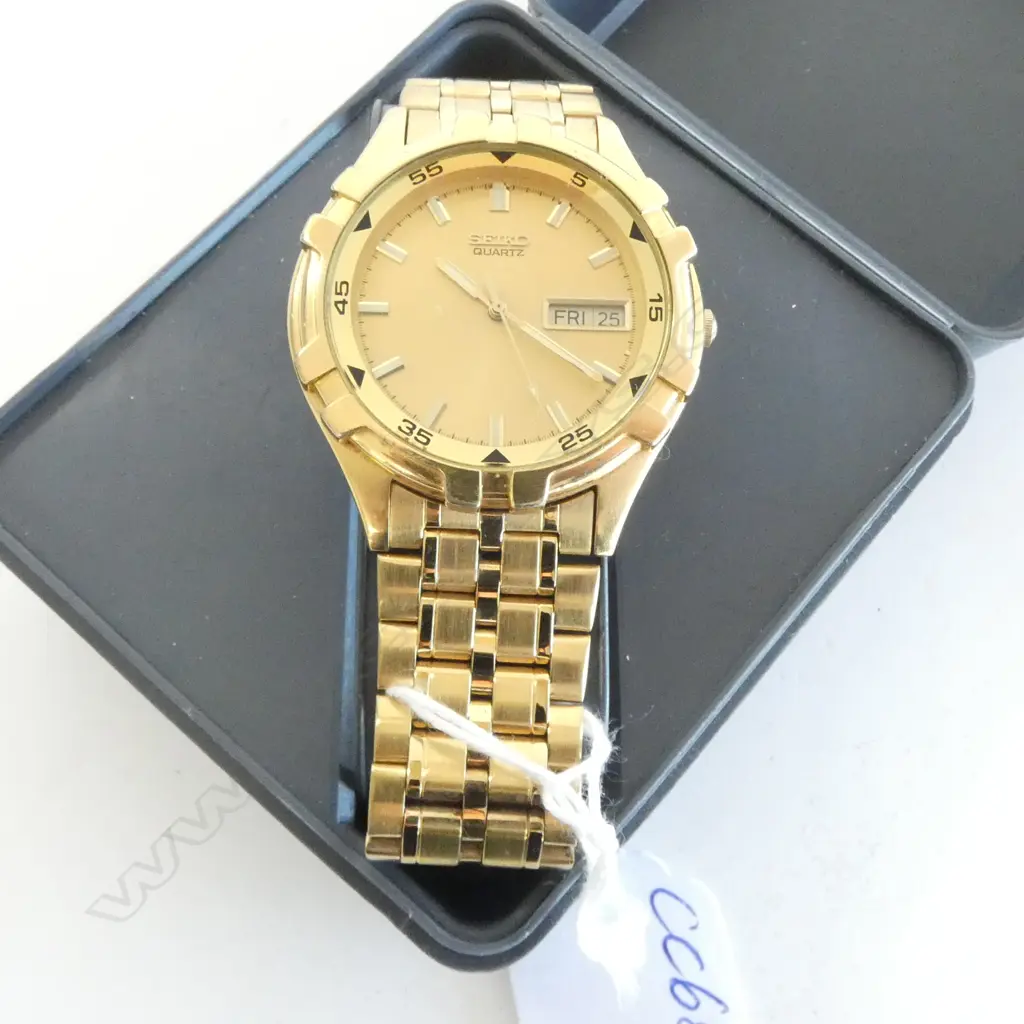 VINTAGE SEIKO QUARTZ WRISTWATCH 7N43-7091 gilt stainless steel in grey plastic Seiko case Image 1++