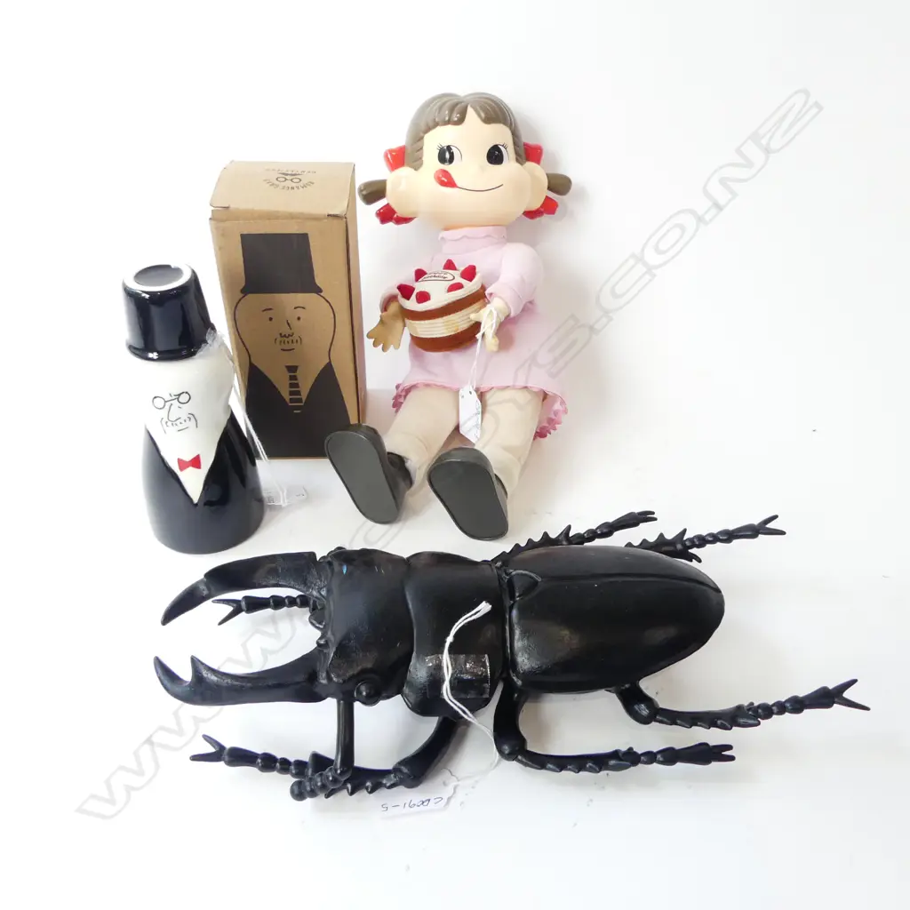 3 JAPANESE ITEMS;1969 VINTAGE CULT FIGURE JAPANESE DOLL, AI FUJIWARA DESIGNER SAKI BOTTLE/CUP, MODEL PLASTIC BEETLE Image 1++