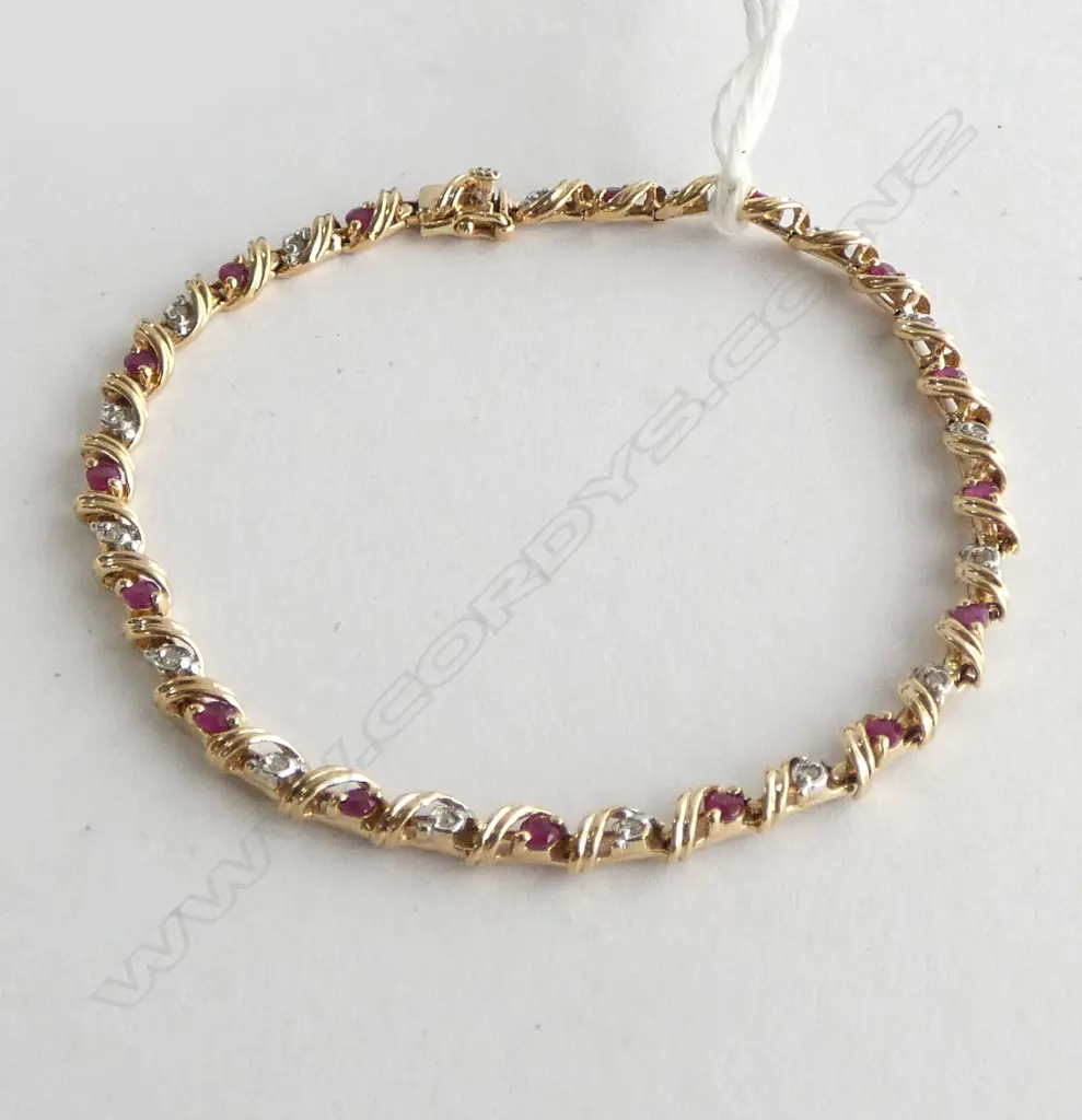 9CT GOLD DIAMOND AND RUBY TENNIS BRACELET 5.68gm Image 1++