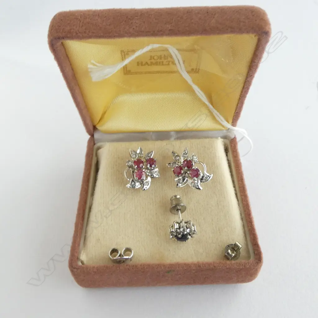PAIR OF STERLING SILVER AND RUBY FLORAL EARRINGS (PLUS SILVER BLUE AND WHITE STONE STUD EARRING) Image 1++
