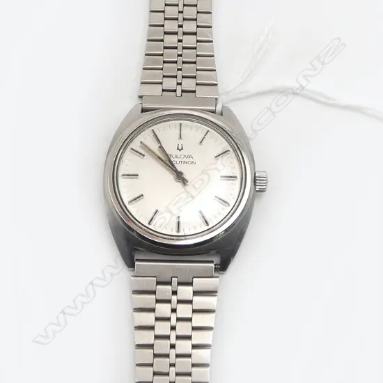 VINTAGE BULOVA ACCUTRON GENT'S stainless WRISTWATCH w stainless bracelet strap. c.1980. Working