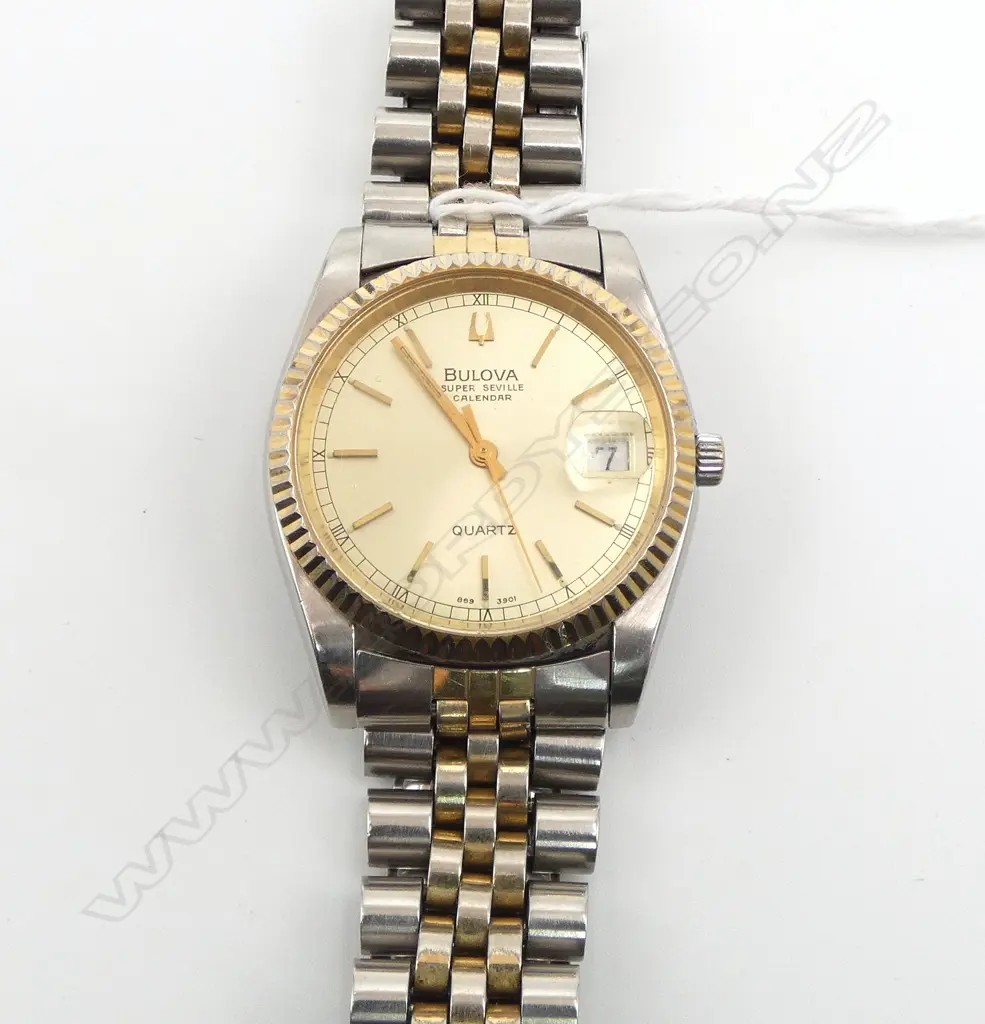 VINTAGE BULOVA SUPER SEVILLE CALENDER GENT'S GOLD PLATE & stainless WRISTWATCH w stainless strap. c.1980. Working Image 1++