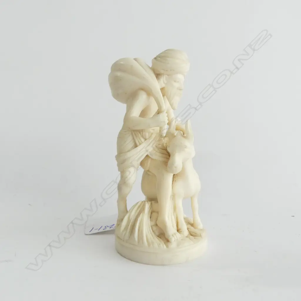 OLD INDIAN SOLID CARVED IVORY FIGURE GROUP of a farmer with sacks and mule. Circular base H.110mm Image 1++