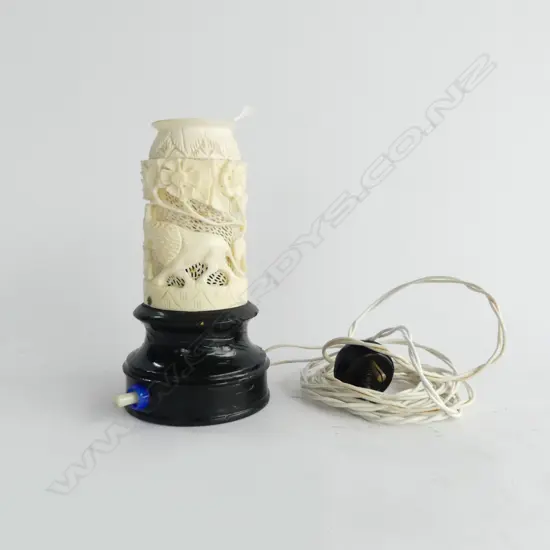 OLD INDIAN CARVED IVORY NIGHT LIGHT with lion etc. Chip to edge. Wooden base. H.150mm