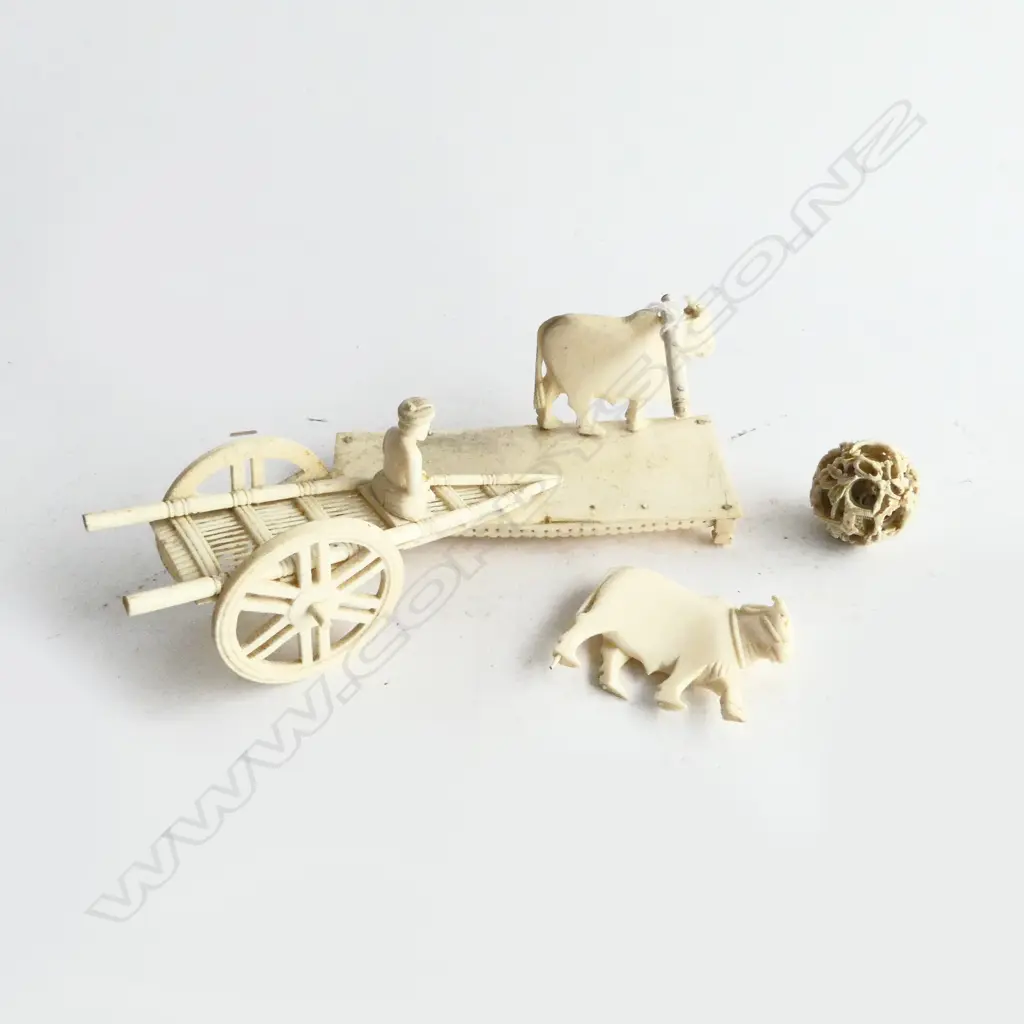 OLD INDIAN CARVED IVORY 2 OX PULLING CART SCULPTURE on plinth. Minor faults. L.120mm. + Chinese ivory puzzle ball Image 1++