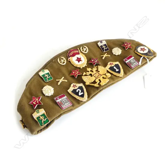 GREEN RUSSIAN ARMY CAP WITH ASST. RUSSIAN BADGES
