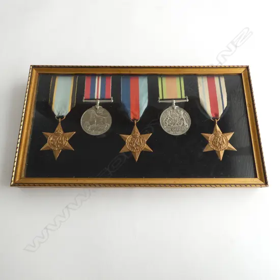 FIVE FRAMED MILITARY MEDALS; 3 AFRICA STARS & 2 DEFENCE MEDALS...