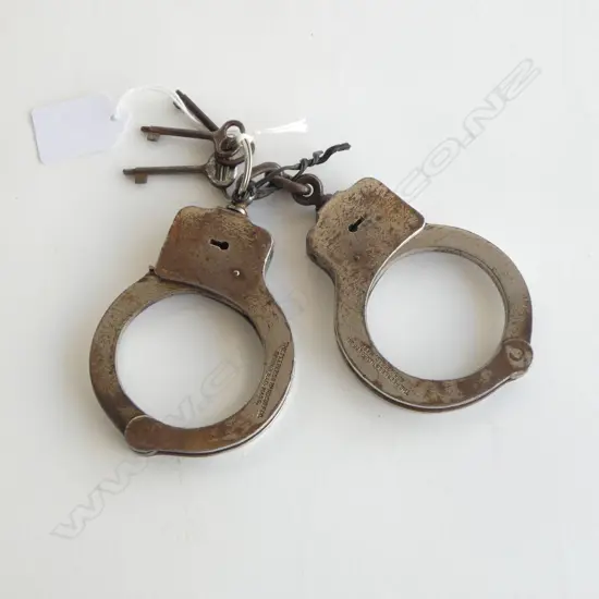 PR HANDCUFFS 'THE PEERLESS HANDCUFF CO USA'