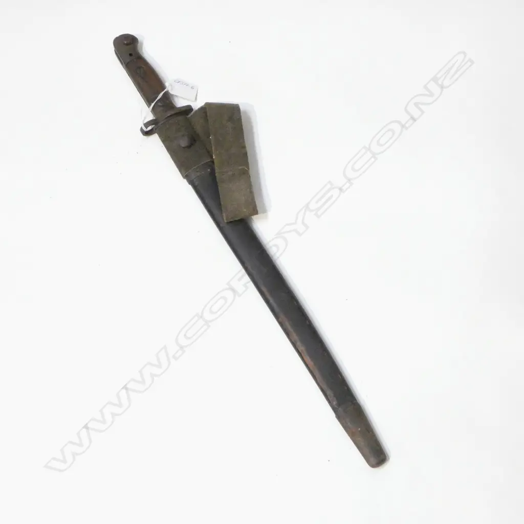 BAYONET IN SCABBARD with leather frog 1 wooden grip with small chip, Scabbard w leather cover Image 1++