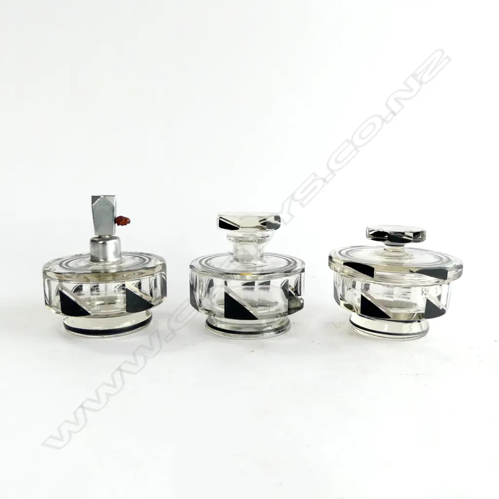 3 PCE ART DECO SET; 2 PERFUME BOTTLES + LIDDED CONTAINER H.105mm ON WITH RUST Image 1++