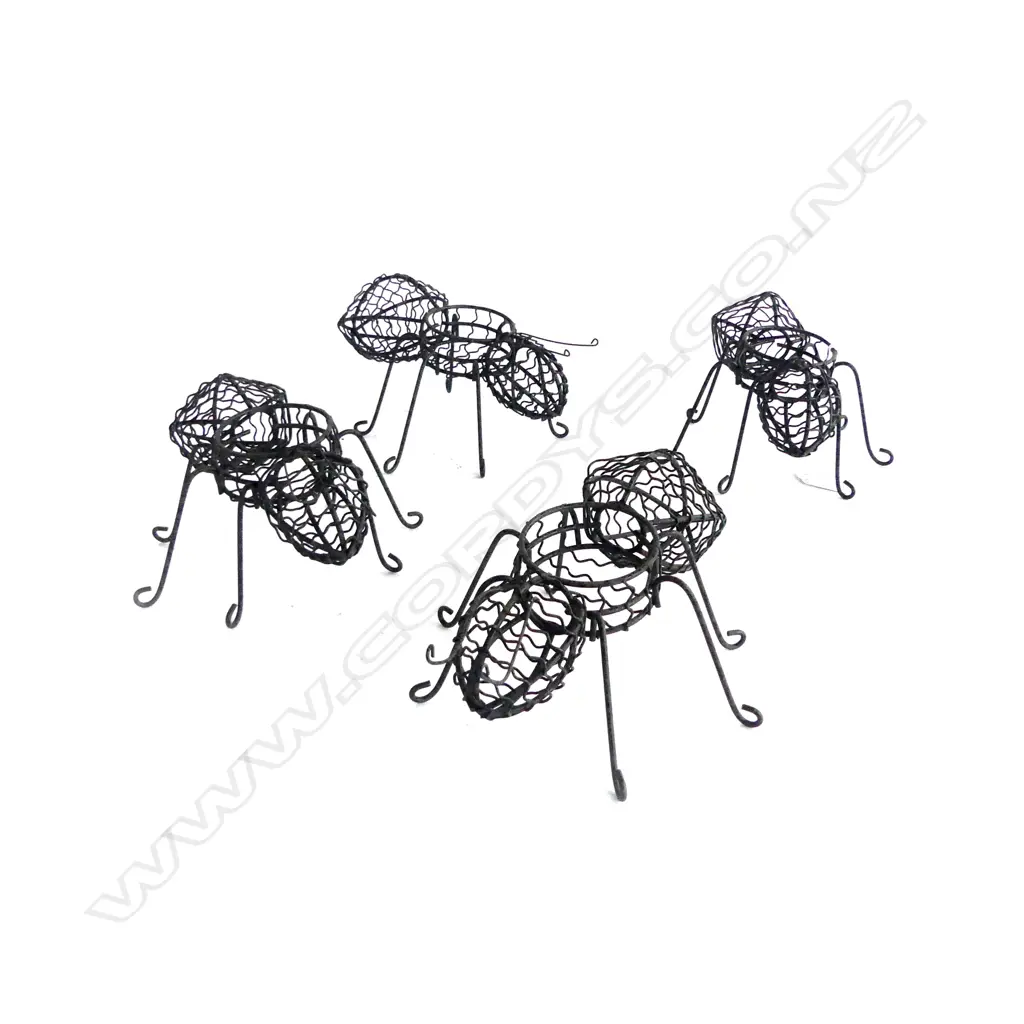4 METAL ANT TEALIGHT HOLDERS L.230mm (ONE ANTENNA MISSING) Image 1++