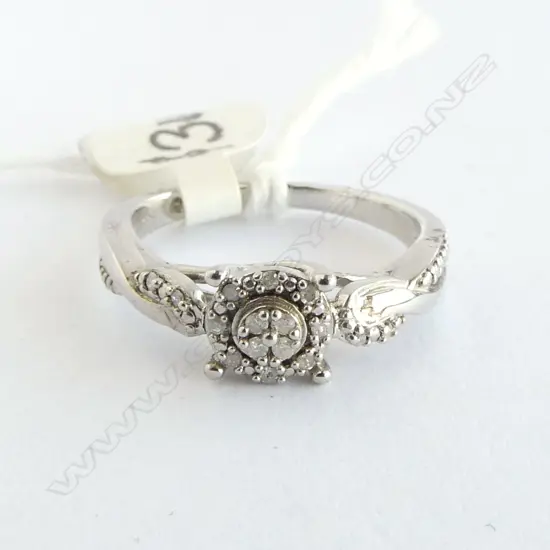 SILVER & DIAMOND SET RING. SIZE N