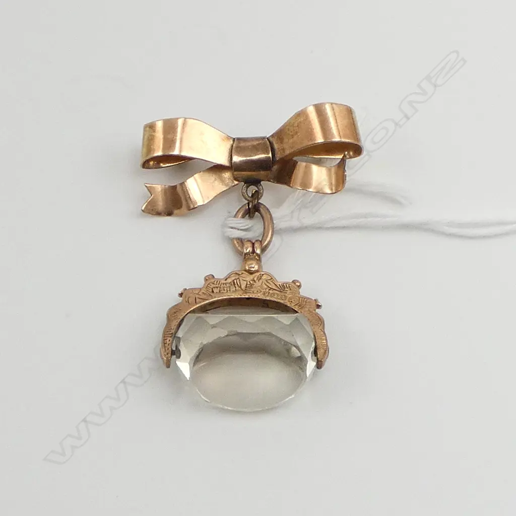 9ct GOLD c.1900 &  QUARTZ FOB SPINNER ON 9ct GOLD BOW BROOCH suspension. Hallmarked. 8.66gms Image 1++
