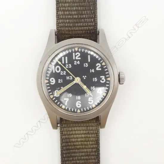 VINTAGE HAMILTON MANUAL WIND GENT'S stainless WRISTWATCH black dial w canvas strap. c.1980. Working