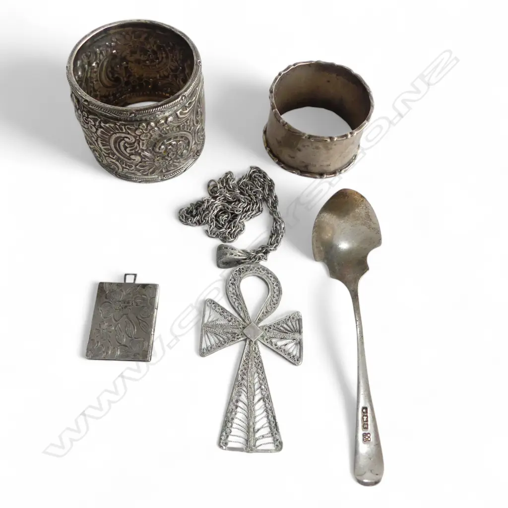 ASST. SILVER: 2 napkin rings + cross pendant on chain + book locket + sugar spoon 130gms Image 1++