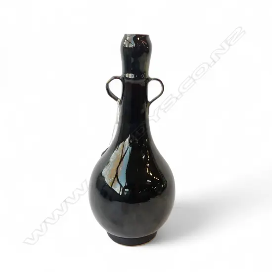 JAPANESE variable dark LUSTRE GLAZED BOTTLE FORM VASE with loop handles to the neck. H.240mm 