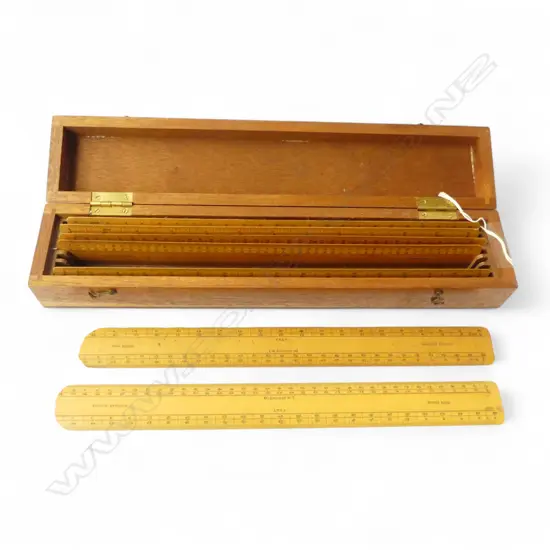 SET OF 7 WOODEN SCALE RULES IN MAHOGANY BOX 15,30,40,60,80,100 CHAINS TO 1”, L.355MM