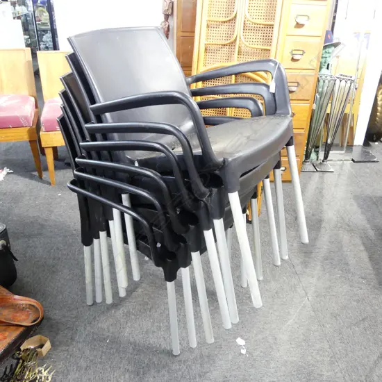 6 BLACK PLASTIC OUTDOOR CHAIRS