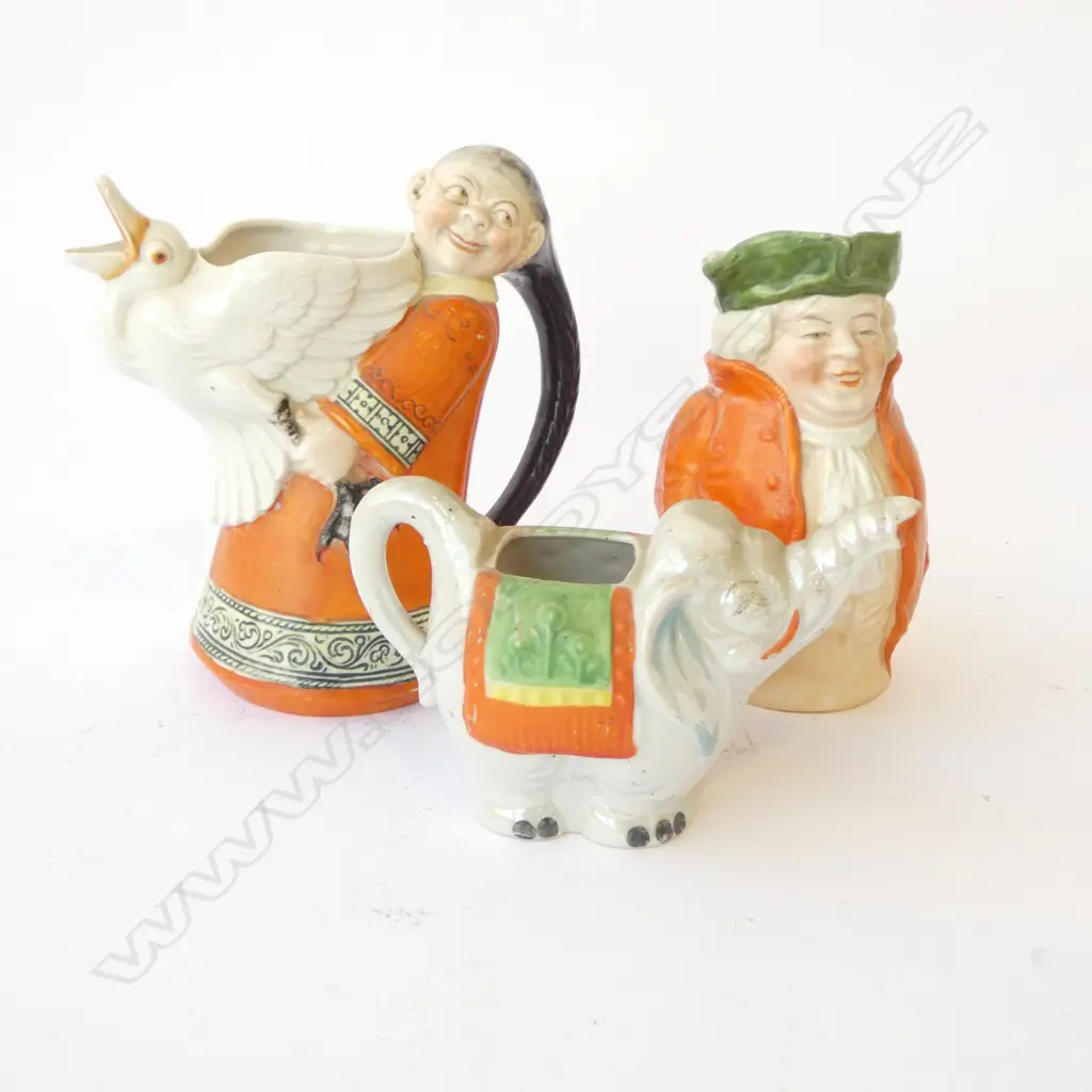 THREE PORCELAIN NOVELTY JUGS Image 1++