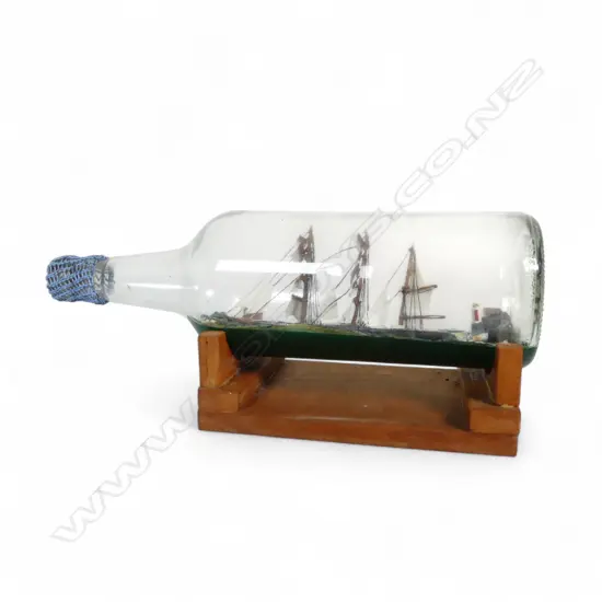 SAILING SHIP IN BOTTLE ON WOOD STAND L300MM