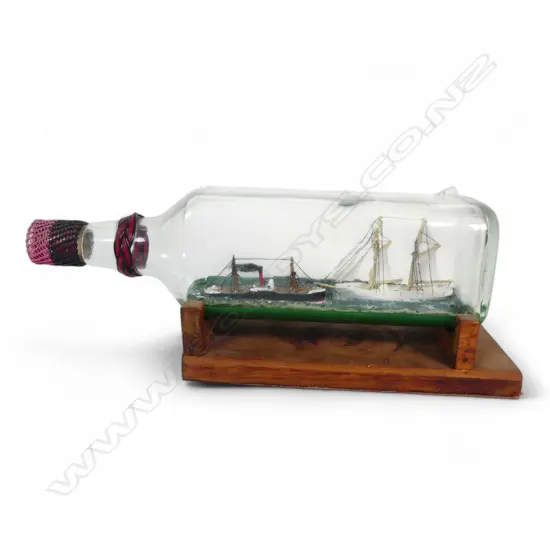 2 SHIPS IN BOTTLE ON WOOD STAND L310MM