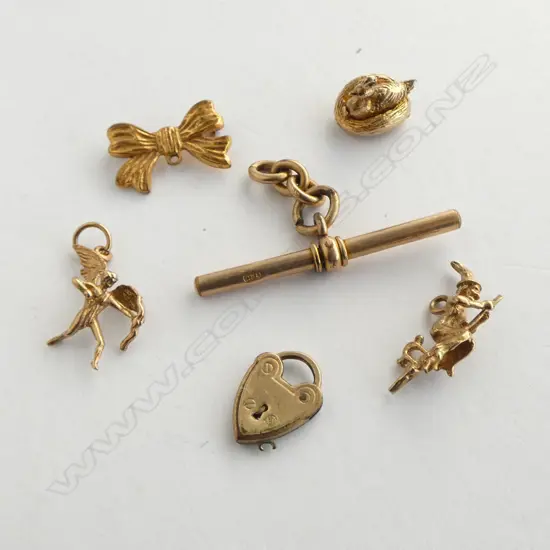 3 9CT GOLD CHARMS (6.92gm) & 3 GOLD PLATED PIECES