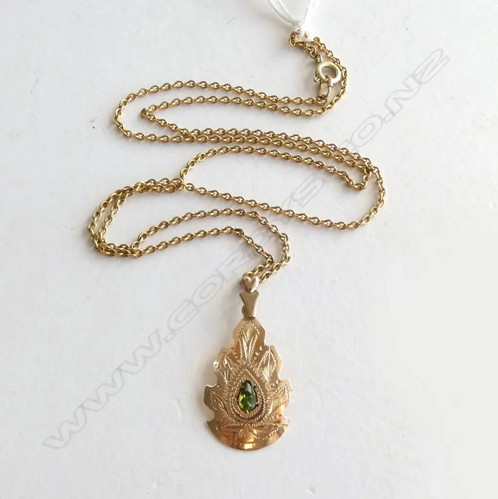 **RTV**  9CT ROSE GOLD & PERIDOT PENDANT ON GOLD TONE CHAIN. 1.82gm Image 1++