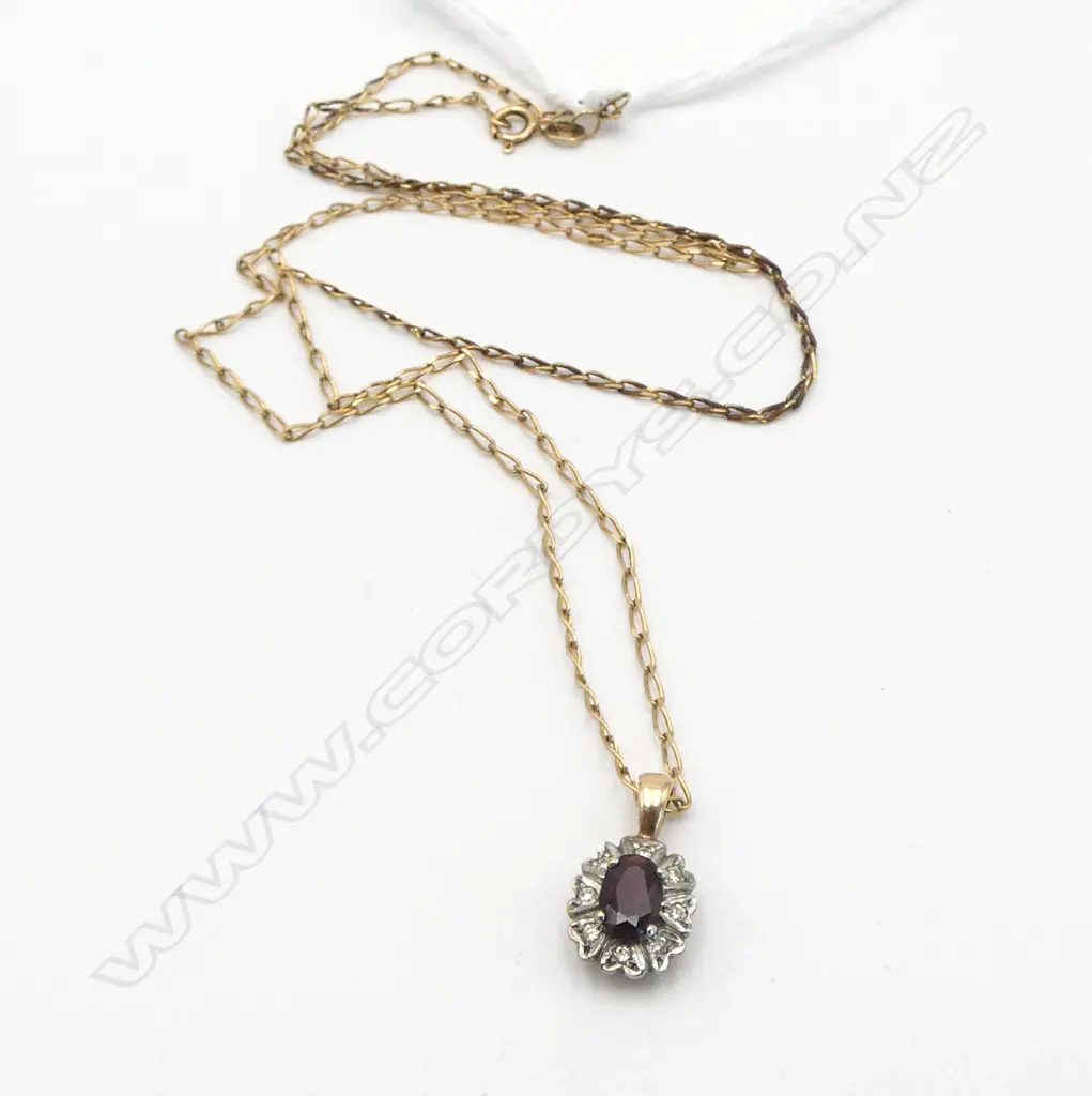 9ct GOLD GARNET & DIAMOND PENDANT on 9ct GOLD FINE CHAIN 2.27gms Image 1++