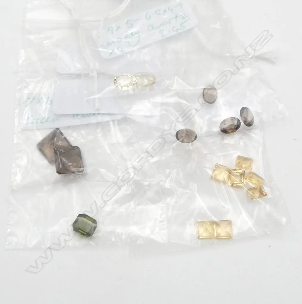 LOOSE STONES; 2 YELLOW BERYL 2ct,  GREEN TOURMALINE 1.20ct, 7 CITRINES 4.32ct, 6 SMOKEY QUARTZ  8.49ct Image 1++