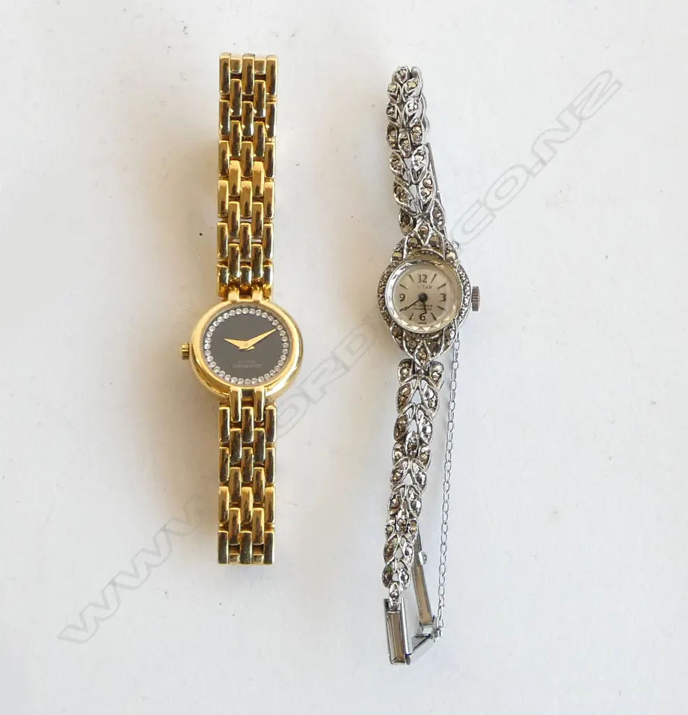 2 VINTAGE LADIES WRISTWATCHES; RAYMOND WEIL 18ct plated 'Geneve' & TITAN MARCASITE Image 1++