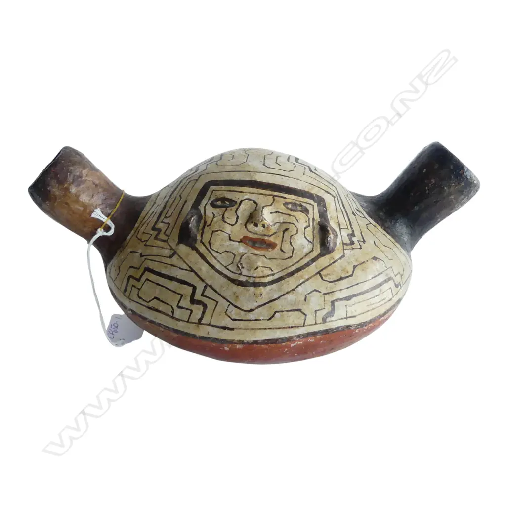 **RTV** PERUVIAN SHIPIBO POTTERY VESSEL with twin spouts, Labelled 'Amazon River',  with pigment painted geomet Image 1++
