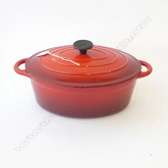 RED CAST IRON LIDDED CASSEROLE ‘CLASSICA’, L.300MM-365MM SOME INTERNAL STAINING