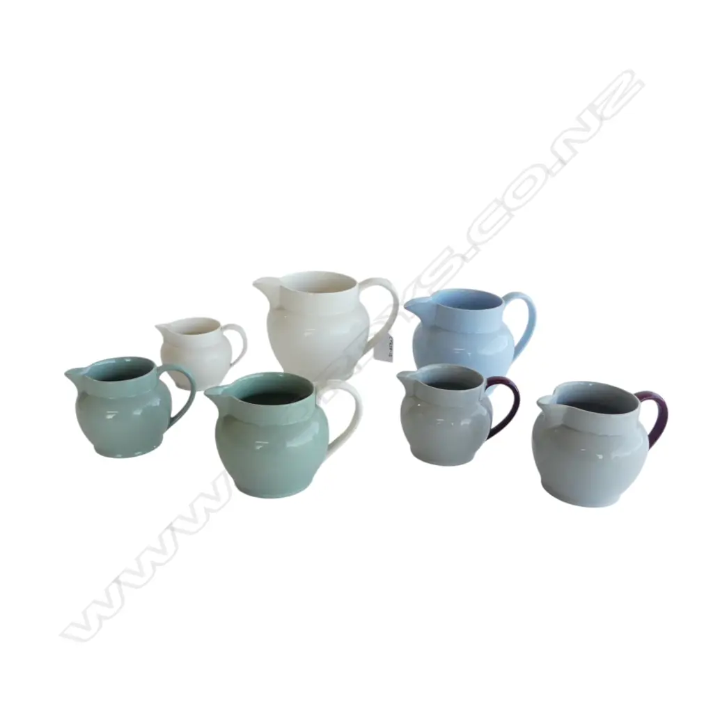 COLLECTION OF 7 PLAIN GLAZE WEDGWOOD JUGS Image 1++