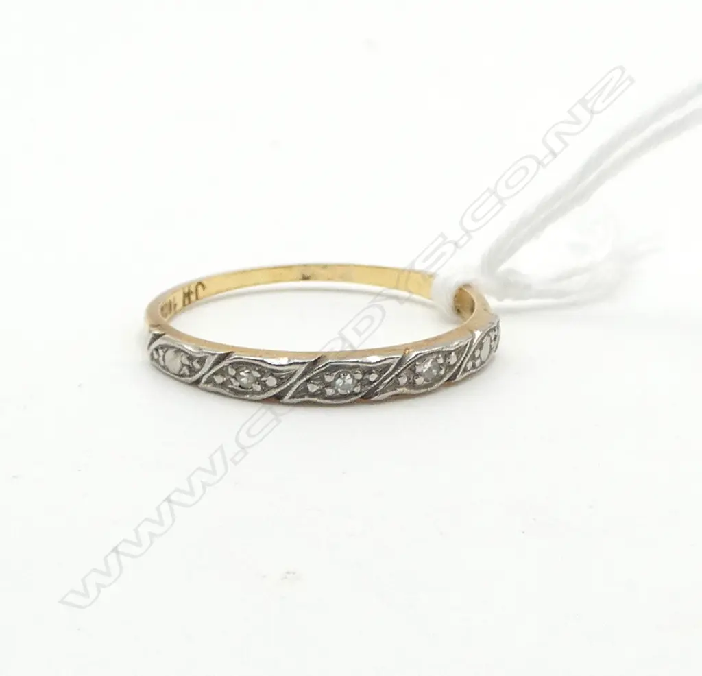 18CT GOLD AND DIAMOND BAND (TDW. 0.45ct) 2gms size Q VALUATION ATTACHED Image 1++
