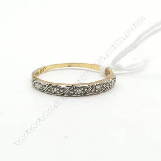 18CT GOLD AND DIAMOND BAND (TDW. 0.45ct) 2gms size Q VALUATION ATTACHED