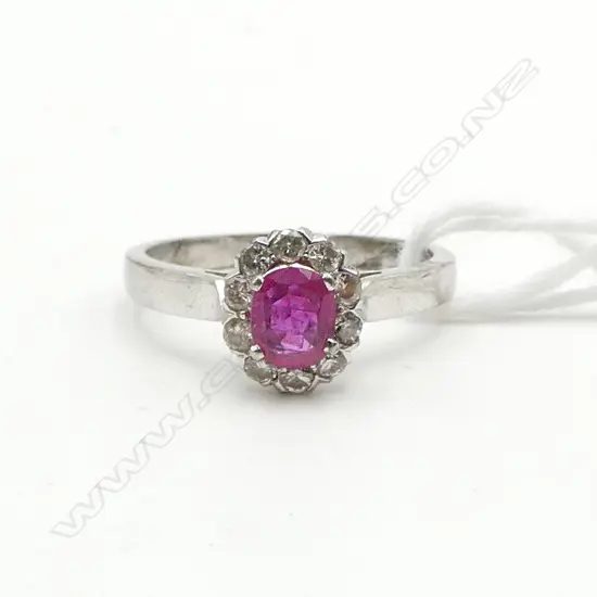Unknown white metal RUBY & DIAMOND RING. SIZE N. 2.7gms