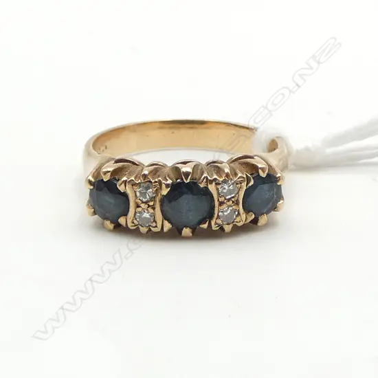 9CT GOLD SAPPHIRE AND DIAMOND RING 4.16gms SIZE N1/2 VALUATION ATTACHED