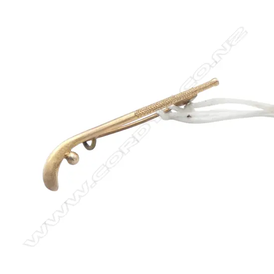 9ct ROSE GOLD HOCKEY STICK BROOCH with ball pin not gold. 2gms