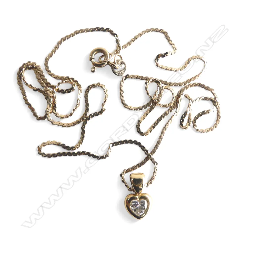 (15) 9CT GOLD AND DIAMOND (0.25CT)  PENDANT ON GOLD CHAIN 2.78gms (val $3,199)ATTACHED Image 1++