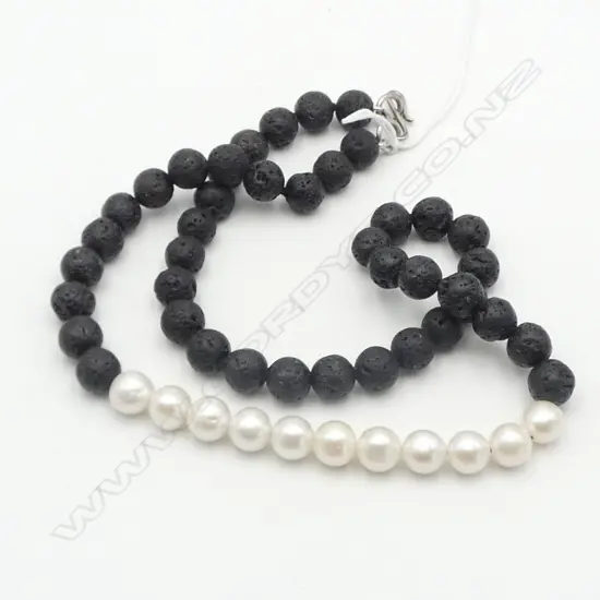 LYNN KELLY PEARL & LAVA NECKLACE with silver clasp. L.500mm. With card from Moray Gallery details verso