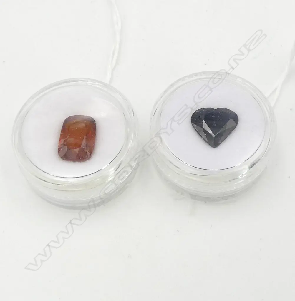 TWO GEMSTONES; BLUE SAPPHIRE, HEART CUT, 3.63ct & CUSHION CUT HESSONITE GARNET, 5.45ct  (inclusions) Image 1++