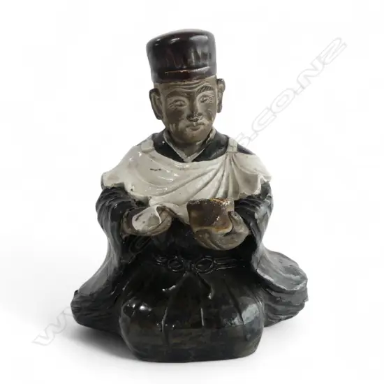 ORIENTAL POTTERY SCULPTURE OF A SEATED GENT WITH BOWL white glazed apron H.220mm