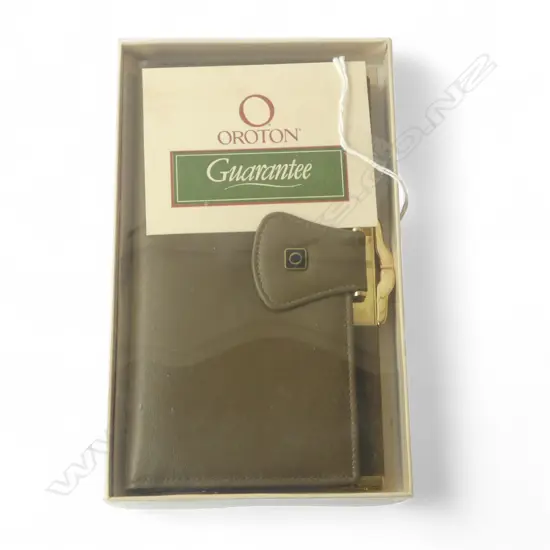 OROTON LEATHER PURSE unused in original box with card