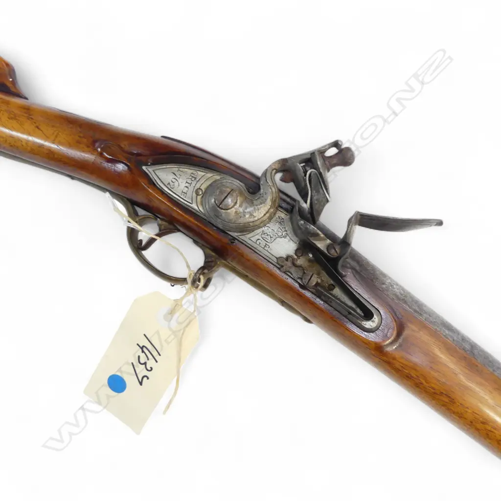 12 Bore Pedersoli reproduction black powder flintlock Brown Bess musket.42" barrel.Lock marked Crown ober GP  and Grice 1762. Metal work a grey patina.Brass ramrod pipes, side plate, trigger guard and butt plate. Good three quarter length stock.Complete with ramrod and sling swivels. Action strong. GWC. Provenance: Militaria Auction, 06/11/2011, Lot 1437, $800.  Fire Arms License Required. Image 1++