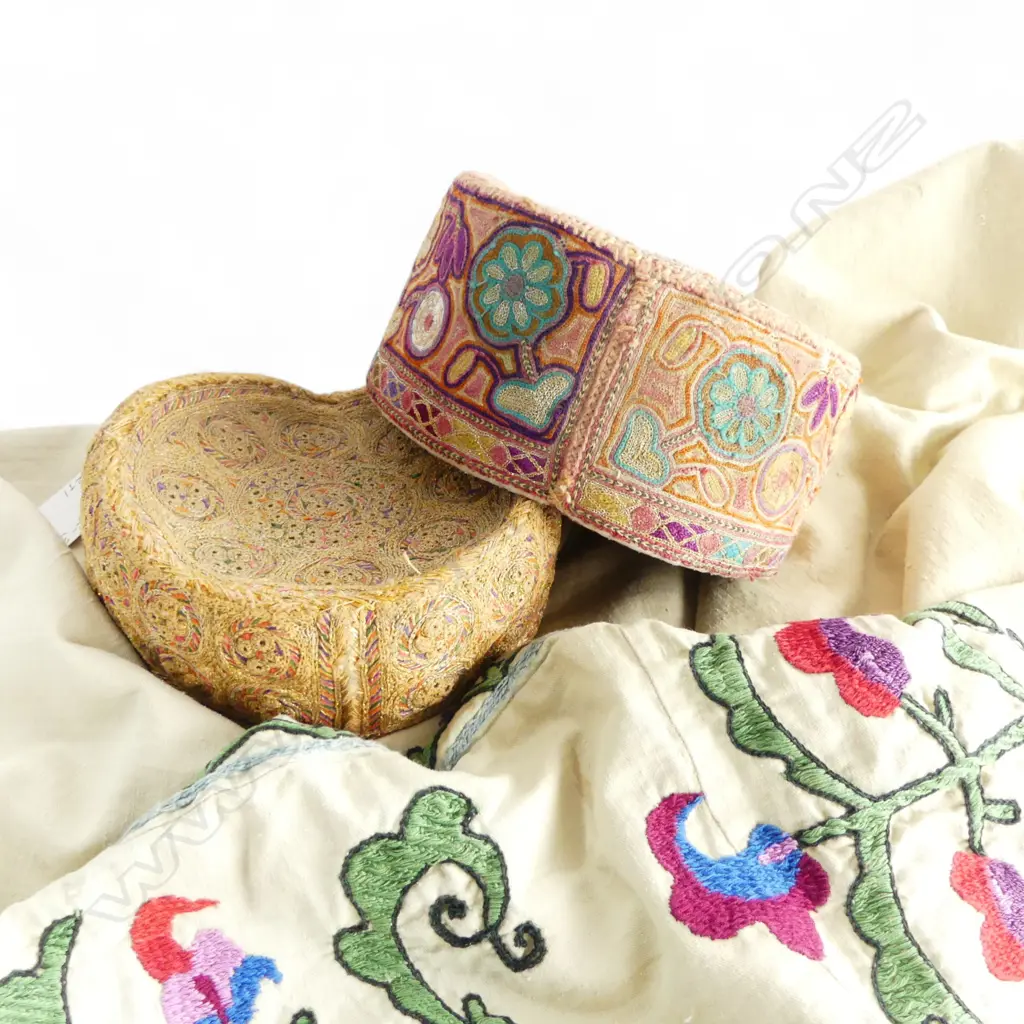 TWO TRADITIONAL UZBEK CAPS, handstitched, gold/silver thread & UZBEK SUZANI (wall hanging), hand stitched, 1450 x 1100mm Image 1++