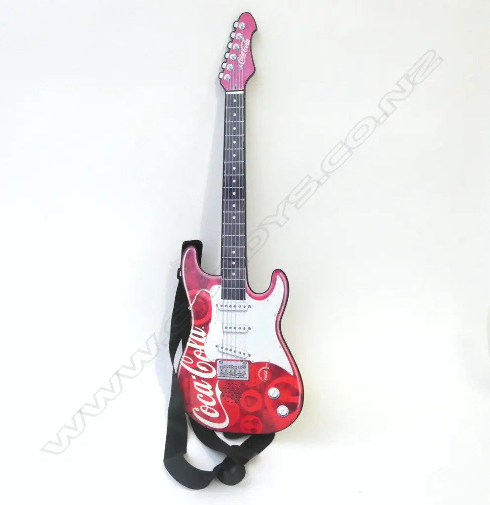 Toy guitar plays music. Branded Coca-Cola. L.740mm Image 1++