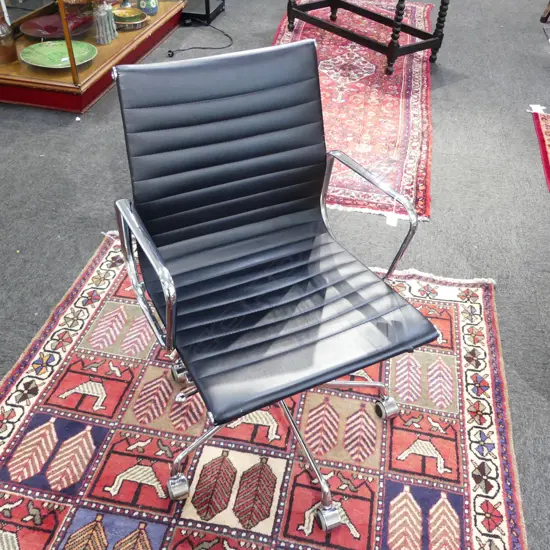 EAMES STYLE OFFICE CHAIR, tear to black vinyl