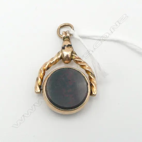 9CT GOLD AND BLOODSTONE SPINNER (old repairs) 5.16gms