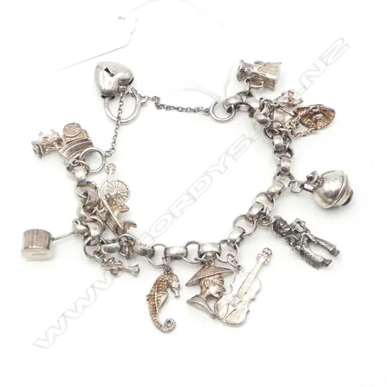 SILVER CHARM BRACELET WITH 14 CHARMS  51.64gms